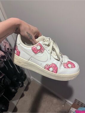 Nike Women’s White Leather Sneakers with Pink Donut Graphics